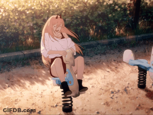 A Girl With Horns Is Sitting On A Seesaw In A Park GIF