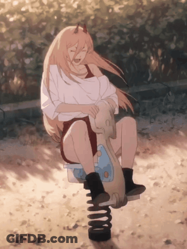 A Girl With Horns Is Sitting On A Seesaw In The Sand GIF