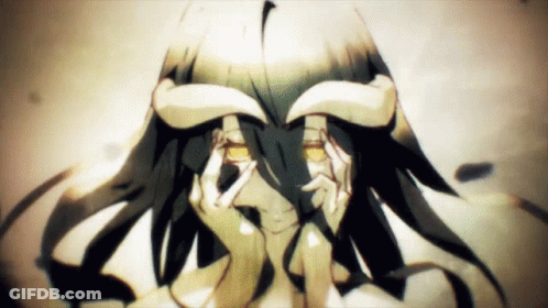 A Girl With Horns On Her Head Covering Her Eyes With Her Hands GIF