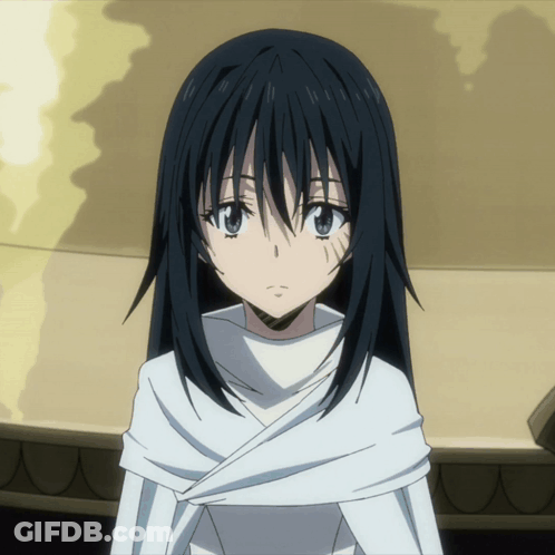 A Girl With Long Black Hair And Blue Eyes Is Wearing A White Dress GIF
