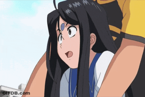 A Girl With Long Black Hair Is Being Held Up By A Man In A Yellow Shirt GIF
