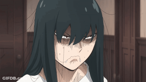 A Girl With Long Black Hair Is Making A Very Angry Face GIF
