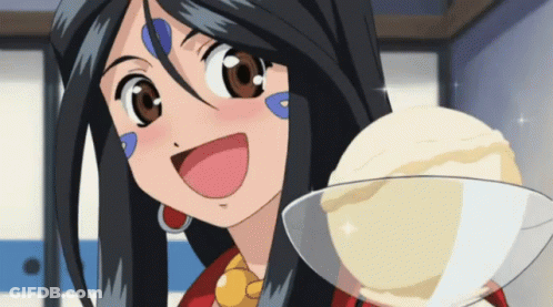 A Girl With Long Black Hair Is Smiling While Holding A Scoop Of Ice Cream GIF