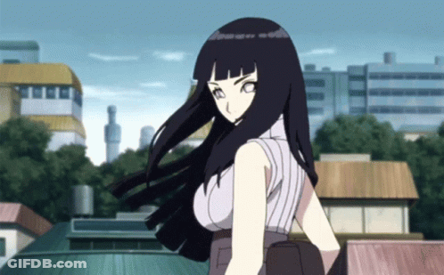 A Girl With Long Black Hair Is Standing In Front Of A Building GIF