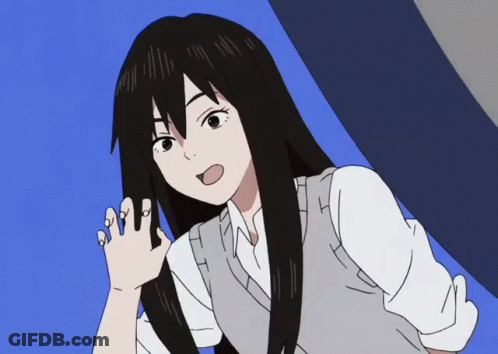 A Girl With Long Black Hair Is Wearing A White Shirt And A Gray Vest GIF
