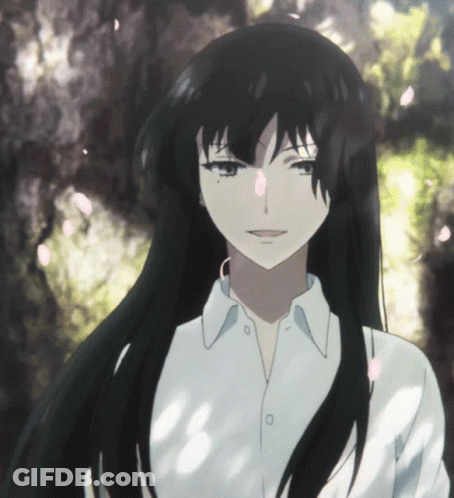 A Girl With Long Black Hair Is Wearing A White Shirt And Earrings GIF