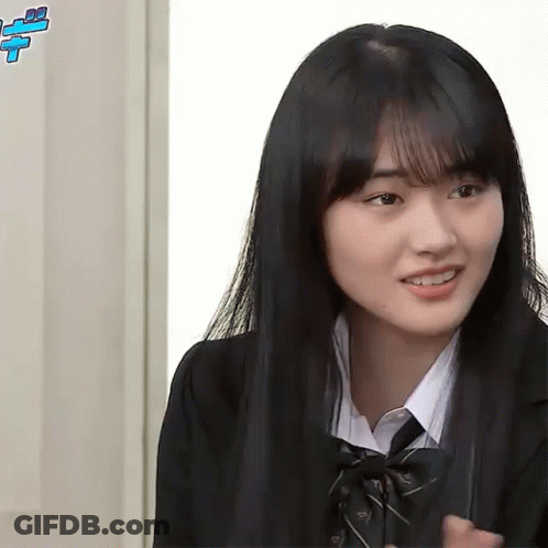 A Girl With Long Black Hair Wearing A School Uniform GIF