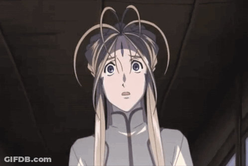 A Girl With Long Blonde Hair And Blue Eyes Looks Up At Something GIF