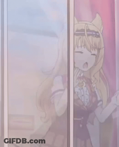 A Girl With Long Blonde Hair Is Behind A Glass Door GIF