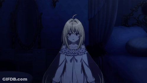 A Girl With Long Blonde Hair Is Standing In A Dark Room GIF