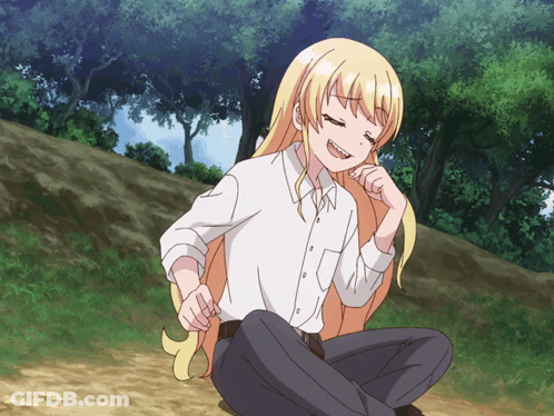 A Girl With Long Blonde Hair Sits On The Ground With Her Eyes Closed GIF