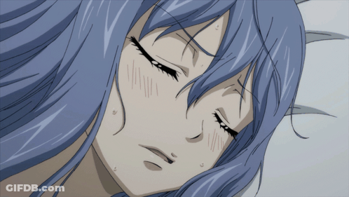 A Girl With Long Blue Hair Is Laying Down With Her Eyes Closed GIF