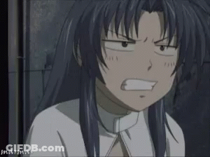 A Girl With Long Blue Hair Is Making A Funny Face In A Cartoon GIF