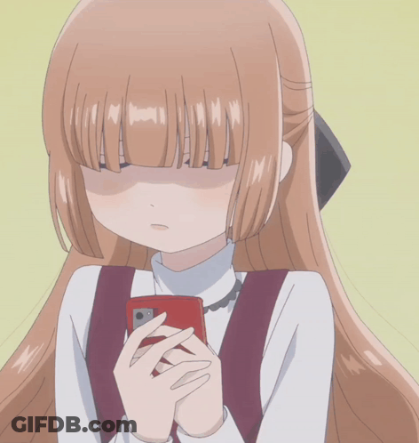 A Girl With Long Brown Hair Is Holding A Cell Phone And Making A Face GIF