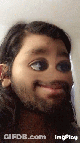 A Girl With Long Hair And A Beard Is Making A Funny Face With Imgplay Written On The Bottom GIF