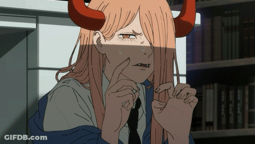A Girl With Long Hair And Red Horns Is Making A Face GIF