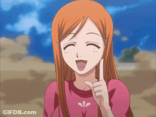 A Girl With Long Orange Hair And A Pink Shirt Is Giving A Thumbs Up GIF