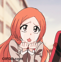 A Girl With Long Orange Hair Is Crying And Covering Her Mouth With Her Hands GIF
