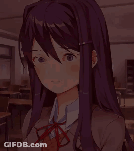 A Girl With Long Purple Hair And Glasses Is Smiling In A Classroom GIF