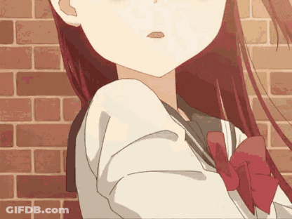 A Girl With Long Red Hair And A Red Bow Tie GIF