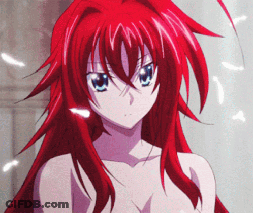 A Girl With Long Red Hair And Blue Eyes GIF