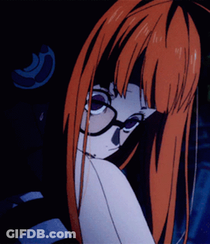 A Girl With Long Red Hair And Glasses Is Looking Over Her Shoulder GIF