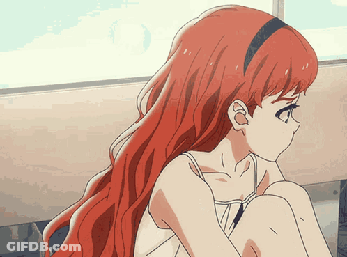 A Girl With Long Red Hair Is Sitting On A Bench GIF
