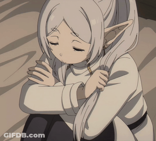 A Girl With Long White Hair And Elf Ears Is Sitting Down With Her Eyes Closed GIF