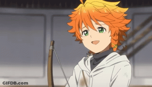 A Girl With Orange Hair And Green Eyes Is Smiling While Holding A Bow And Arrow GIF