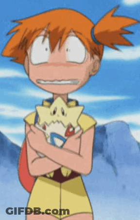 A Girl With Orange Hair Is Holding A Stuffed Animal With A Star On It GIF