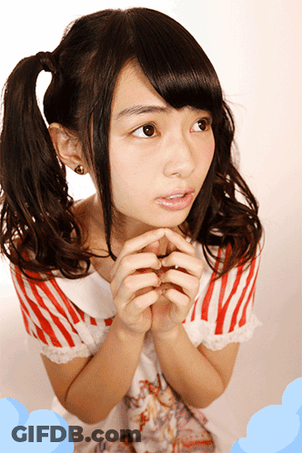 A Girl With Pigtails And A Red And White Striped Shirt Has Her Hands Folded In Front Of Her Face GIF