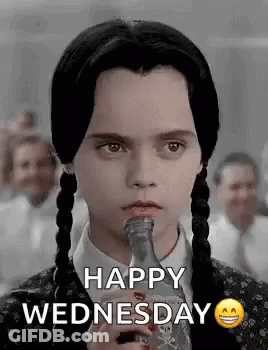 A Girl With Pigtails Is Drinking From A Bottle And Says Happy Wednesday . GIF