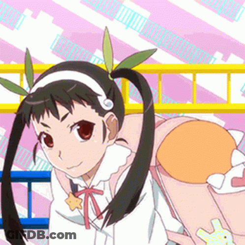 A Girl With Pigtails Is Holding A Stuffed Animal In Her Hand GIF