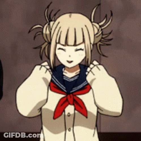 A Girl With Pigtails Is Wearing A Sailor Uniform With A Red Tie Around Her Neck . GIF