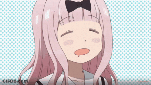A Girl With Pink Hair And A Bow On Her Head Is Making A Face . GIF