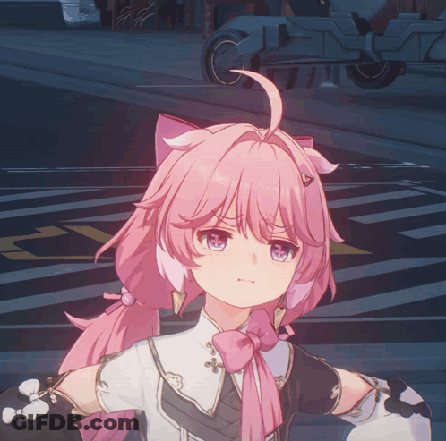 A Girl With Pink Hair And A Pink Bow Tie Looks Angry GIF