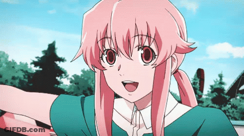 A Girl With Pink Hair And Big Red Eyes Is Smiling GIF