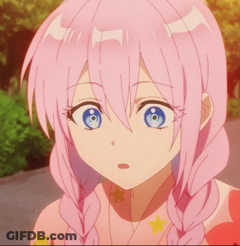 A Girl With Pink Hair And Blue Eyes GIF