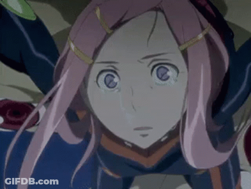 A Girl With Pink Hair And Blue Eyes Is Laying On The Ground GIF