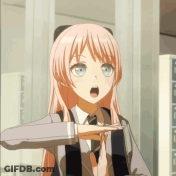 A Girl With Pink Hair And Blue Eyes Is Making A Stop Gesture GIF