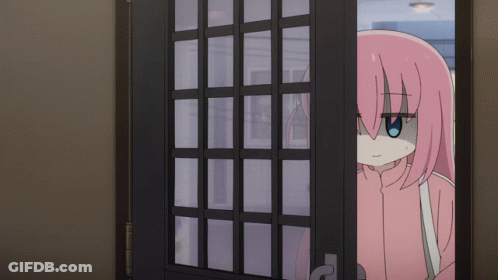 Pink-Haired Girl Peeking Out Door GIF