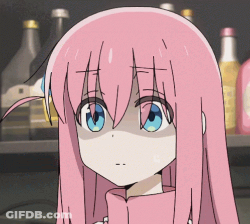 A Girl With Pink Hair And Blue Eyes Is Standing In Front Of A Shelf Full Of Bottles GIF
