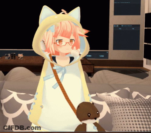 A Girl With Pink Hair And Glasses Is Standing Next To A Stuffed Animal And A Couch GIF