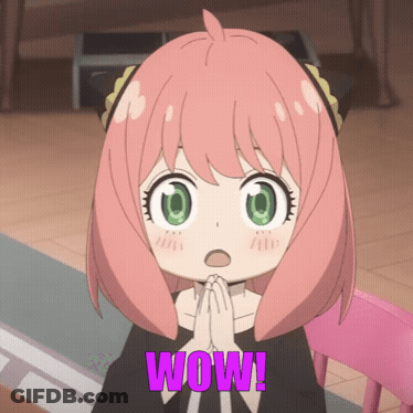 A Girl With Pink Hair And Green Eyes Has The Word Wow On Her Chest GIF