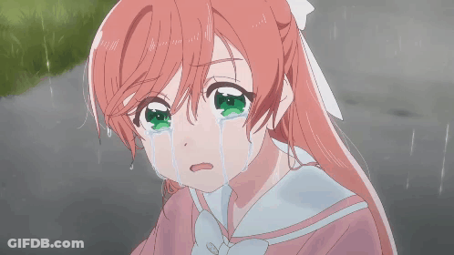 A Girl With Pink Hair And Green Eyes Is Crying In The Rain GIF