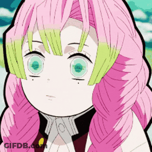 A Girl With Pink Hair And Green Eyes Is Making A Funny Face . GIF