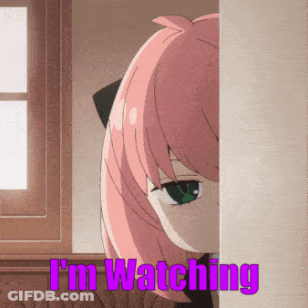 A Girl With Pink Hair And Green Eyes Is Peeking Out From Behind A Wall And The Words I 'M Watching Are Above Her GIF