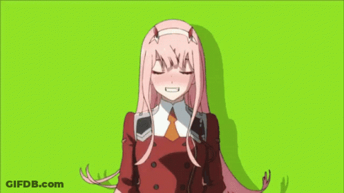 A Girl With Pink Hair And Horns Is Laying Down With Her Eyes Closed . GIF