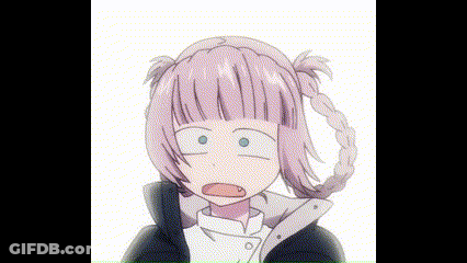 A Girl With Pink Hair And Pigtails Is Making A Funny Face . GIF