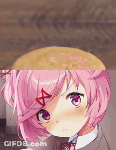 A Girl With Pink Hair And Purple Eyes Has A Red Bow On Her Head GIF